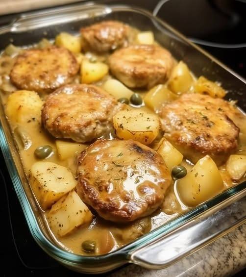 Smothered Pork Chops with Creamy Gravy and Potatoes